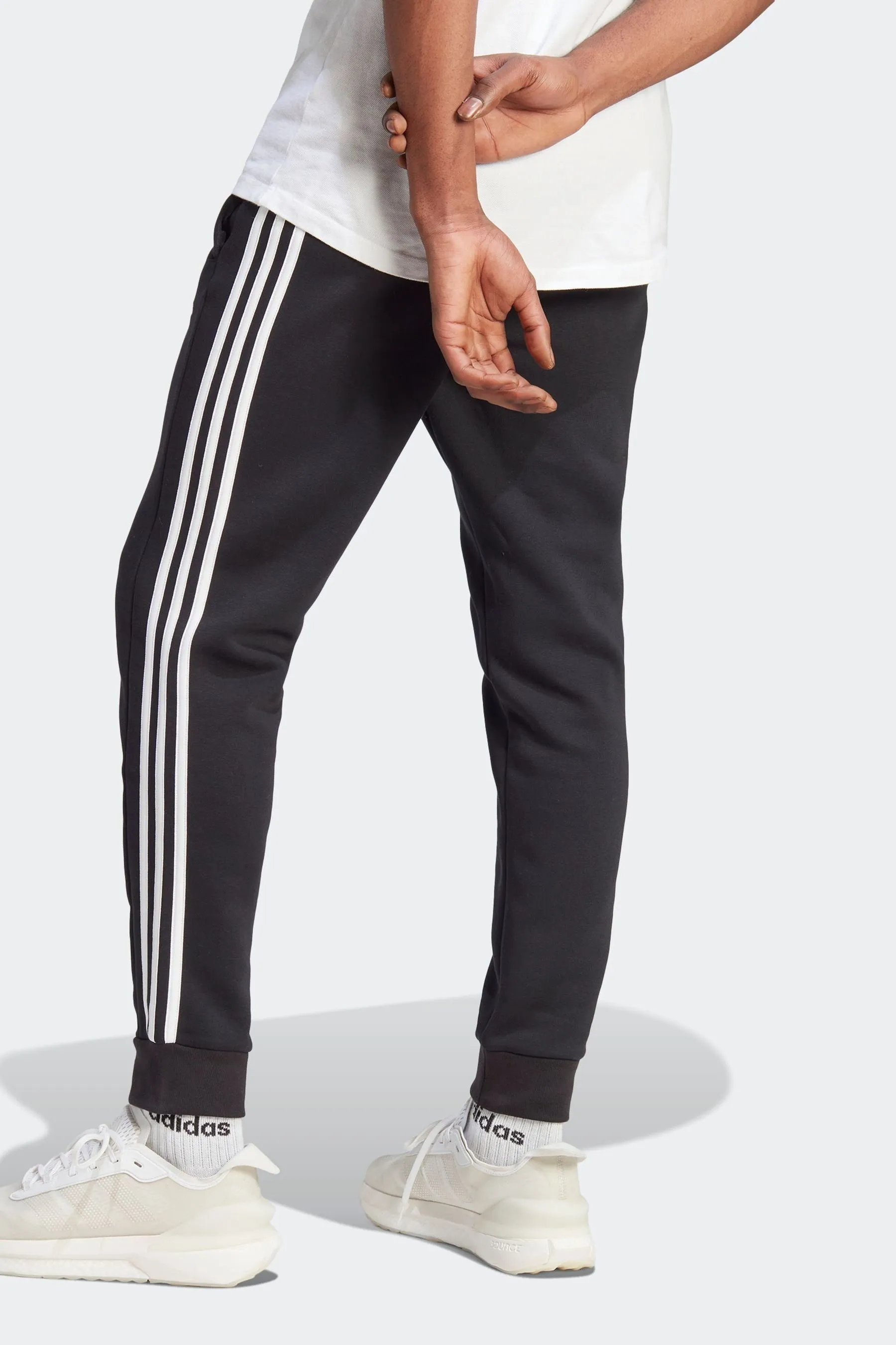 Adidas Must-have - Pantaloni da jogging in pile stretti in fondo con 3 strisce