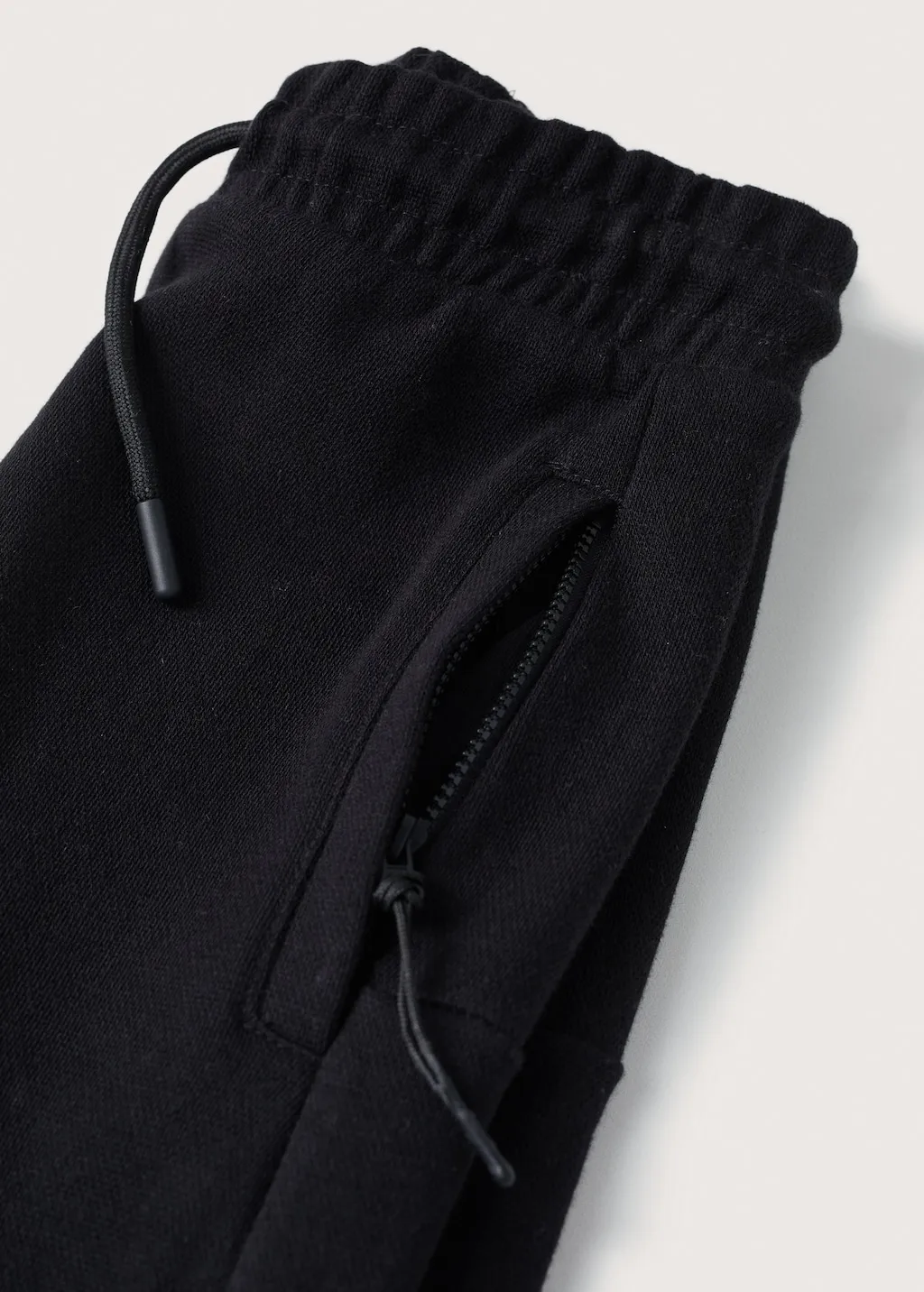 Pantaloni jogger tasche zip